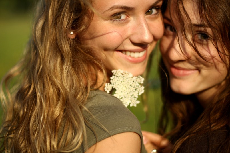 two girls smiling