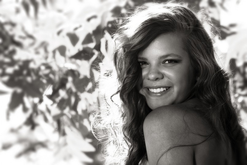 loose curls on smiling woman