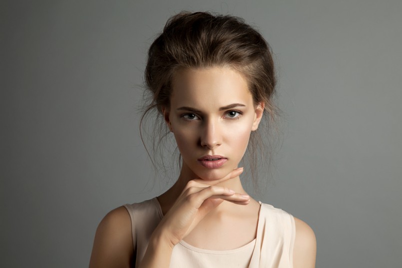Portrait of a blonde young pretty woman with natural make-up