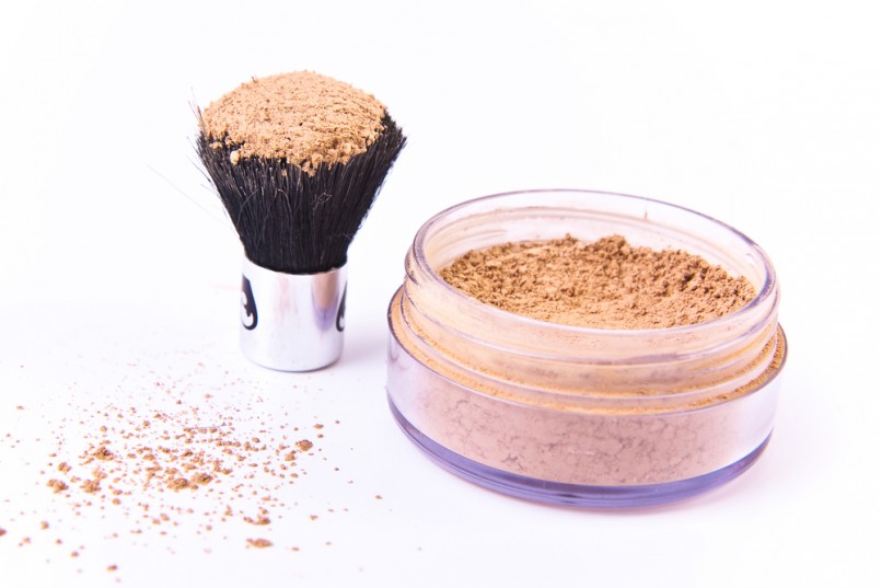 makeup brush and powder isolated