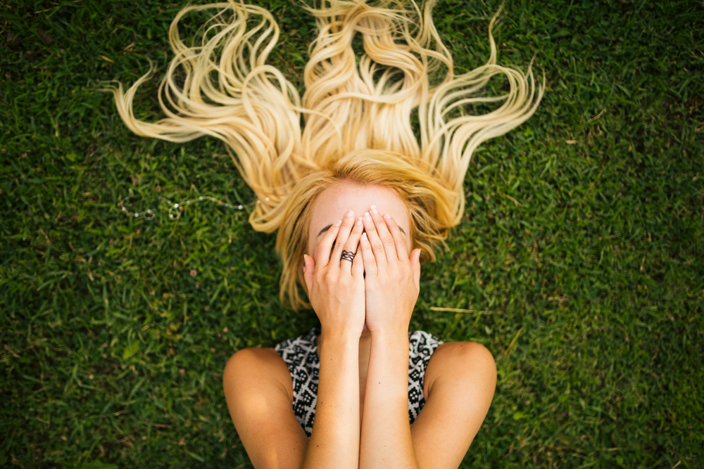 Young blonde woman summer day relaxing