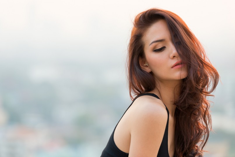 asian woman closing her eye