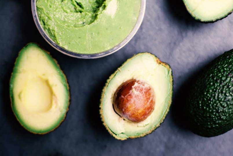 Halved avocados. Top view. Avocado spread. Avocado pasta. Guacamole