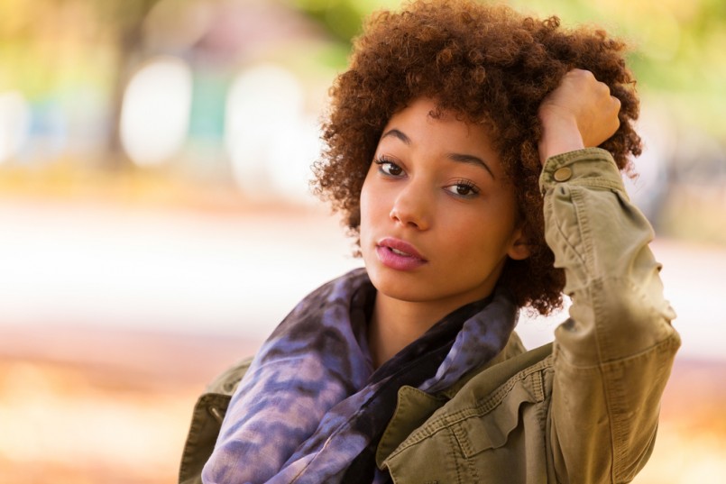 Autumn outdoor portrait of beautiful African American young woman