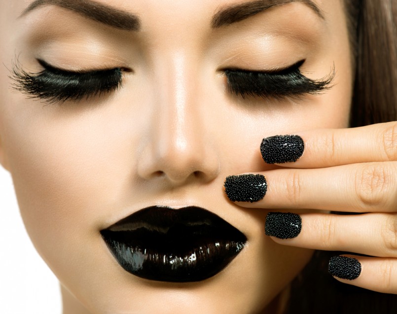 Vogue Style Fashion Girl with Black Lipstick and Trendy Black Caviar Manicure. Long False Eyelashes