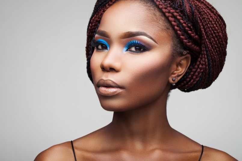 beautiful girl with African roots on a white background
