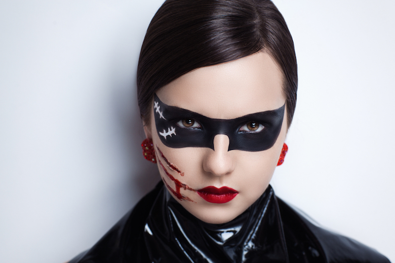 Young beautiful bright showy girl lady model sexy cat. Fairy tale future party cosplay club. new makeup flawless face dark eyes cheeks eyebrows cat lips. Facial mask, volume bleeding scratches claws