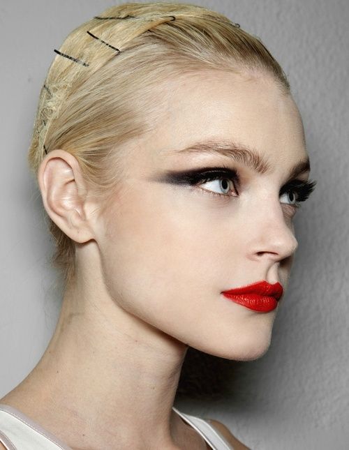 dark eye and bright red lips